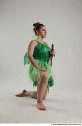 KATERINA KNNELING POSE WITH SWORD